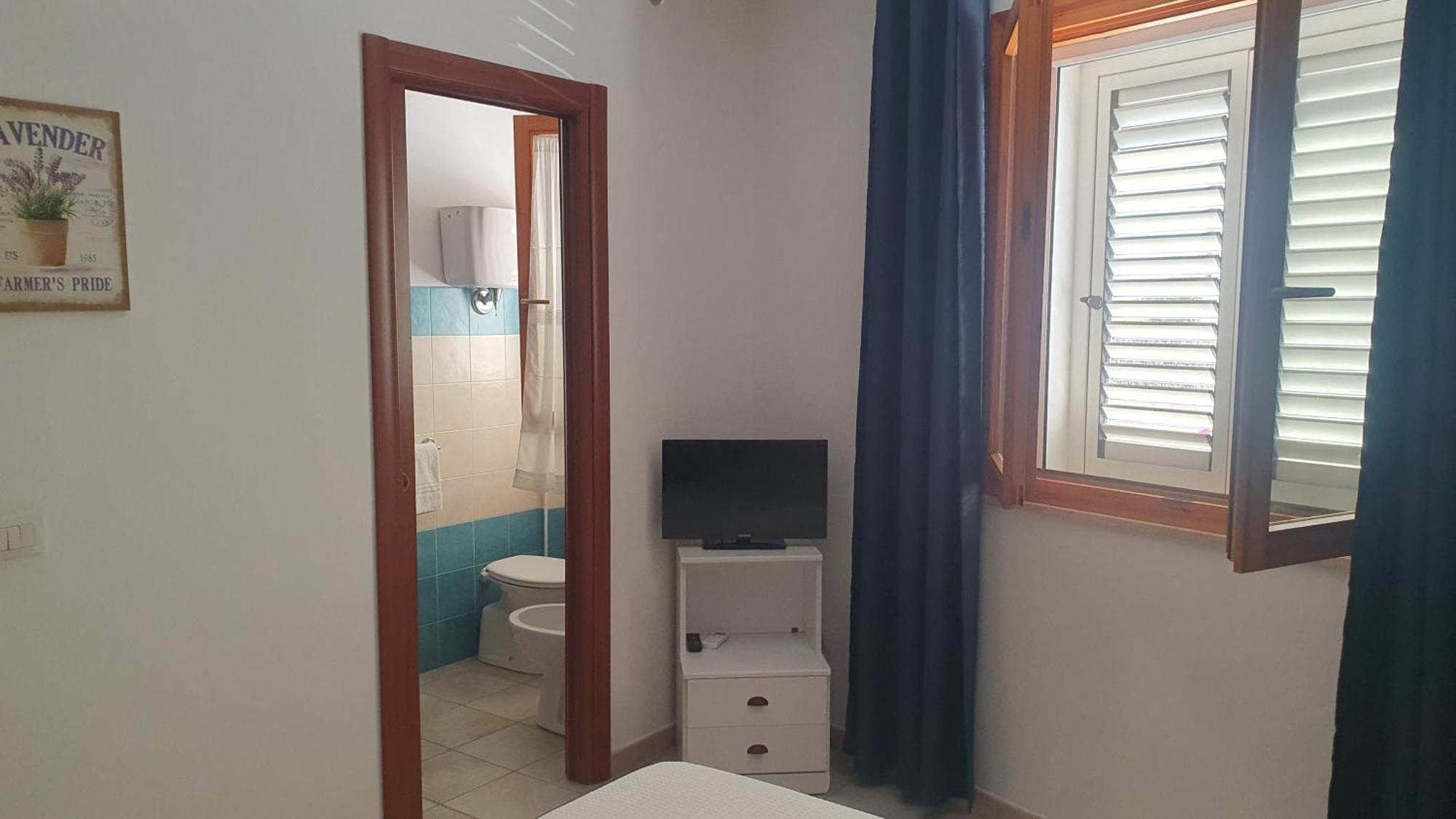 Blue Dolphin Guest House Alghero Buitenkant foto